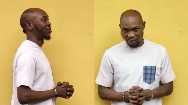 Seun Kuti in handcuff