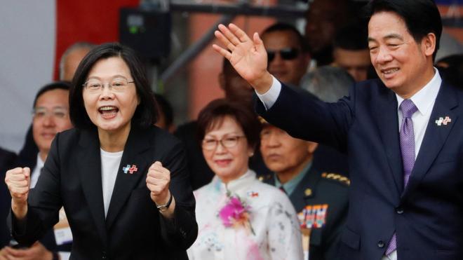 Taiwan's President Tsai Ing-wen gestures next to Taiwan』s Vice President William Lai, during the National Day celebration ceremony in Taipei, Taiwan October 10, 2023.