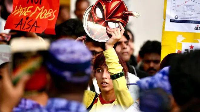 Supporters of Cockroach Janata Party (CJP) participate in a protest demanding the resignation of Indian Union Education Minister Dharmendra Pradhan over the alleged NEET (UG) 2026 paper leak at Jantar Mantar , on June 20, 2026 in New Delhi, India. Members and supporters of the Cockroach Janta Party (CJP) protest to demand the resignation of Union Minister of Education, Dharmendra Pradhan. They claimed him to be "directly responsible" for the recent exam paper leaks in major national-level examinations across the country, including NEET.