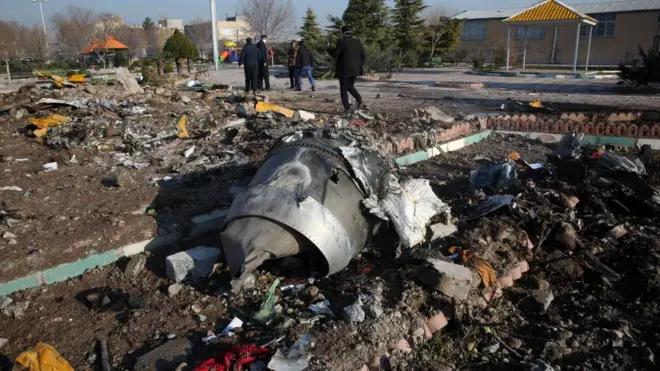 Rescue teams work amid wreckage after a Ukrainian plane crashed in Tehran on 8 January, 2020.