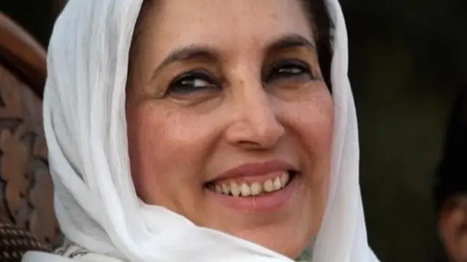 Former Pakistani Prime Minister Benazir Bhutto gazes towards a crowd of thousands of supporters at a campaign rally minutes before she was assassinated in an attack December 27, 2007 in Rawalpindi, Pakistan.