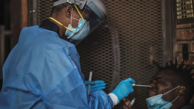 For Gauteng Health Department Official collect samples from one man during door-to-door COVID-19 coronavirus testing drive in Yeoville, Johannesburg,