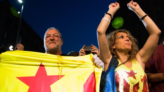 People react to the results of exit polls on September 27, 2015 in Barcelona