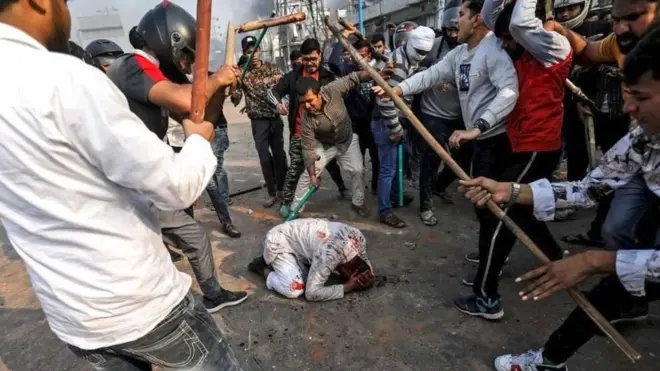 હિંસાનો ભોગ બનેલા યુવકની તસવીર