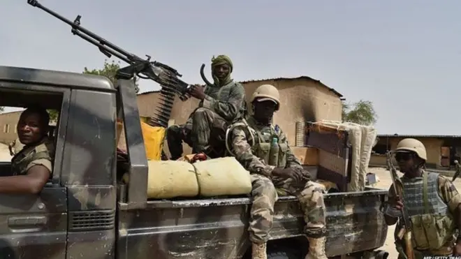 Soldiers dey on top truck