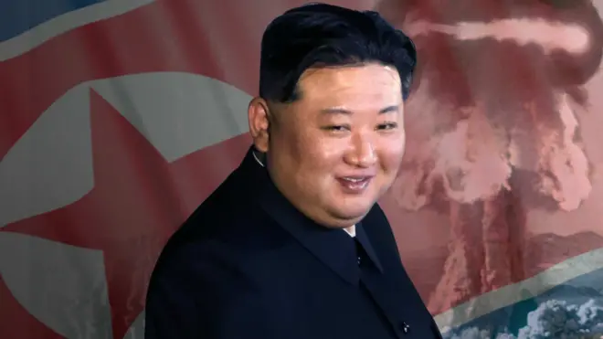 김정은 위원장 뒤로 보이는 인공기와 핵폭발 장면
