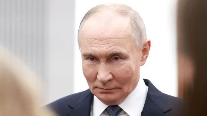 Путін