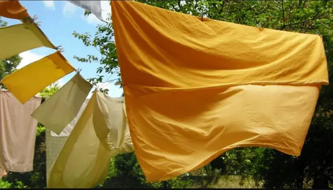 Žuta i narandžasta posteljina na štriku 