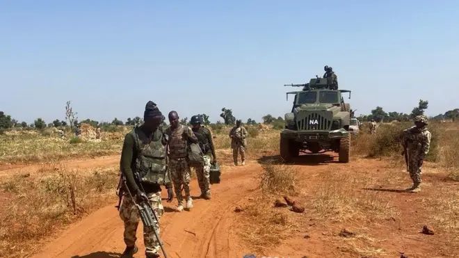 Nigeria Army officers searching di areas wit bomb detectors