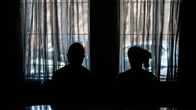 Man and woman in dark