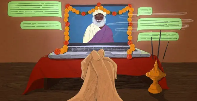 رسم تعبيري يظهر يدين بلون أسمر تصليان بقربها قنديل ذهبي، وأمامها شاشة لابتوب عليها ورود صفراء وحمراء ويظهر منها رسم لرجل كبير في السن شعر لحيته أبيض ويرتدي عمامة بيضاء وزياً من التقليد الهندي وبشرته سوداء اللون. خلفية الشاشة زرقاء. تحت اللابتوب (الكمبيوتر المحمول) هناك شرشف أحمر وبجانب الشاشة يظهر خمس مربعات خضراء مخططة تدل على الكتابة. أرضية الغرفة بنية اللون. والحائط لونه بدرجة بنية أفتح.