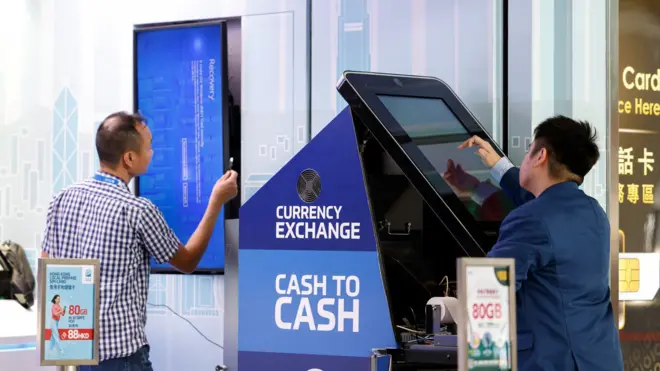 Currency Exchange at Hong Kong airport: Screen showing an error is seen at a currency exchange store at Hong Kong International Airport amid system outages disrupting the operations, in Hong Kong, China, July 19, 2024.