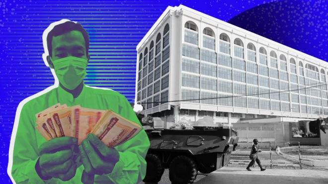 ငွေရေတွက်နေတဲ့ ဘဏ်ဝန်ထမ်းတစ်ဦး သူ့နောက်မှာတင့်ကားလုံခြုံရေးယူထားတဲ့ ရန်ကုန်က မြန်မာနိုင်ငံတော် ဗဟိုဘဏ် 