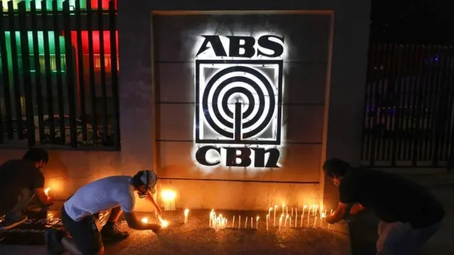 Filipinos light candles in symbolic solidarity outside ABS-CBN network headquarters in Quezon City, Metro Manila, Philippines, on 5 May 2020