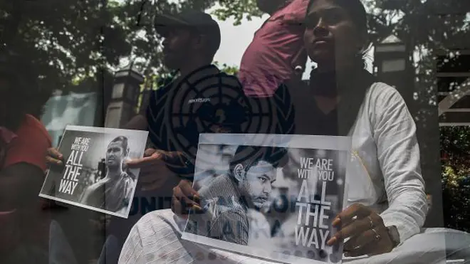 Anti-government demonstrators stage a Satyagraha protest against the government in front of the United Nations office, asking the United Nations to force the government to release the leader of the Inter-University Students' Union Wasantha Mudalige and Reverend Galvewa Siridhamma Thero, in Colombo on November 11, 2022.