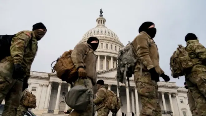 Members of the National Guard arrive to the U.S. Capitol days after supporters of U.S. President Donald Trump stormed the Capitol in Washington