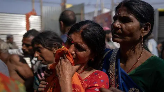 Hindu pilgrims stand inside a lost and found centre after they lost their relatives in crowds during the Maha Kumbh Mela festival in Prayagraj, India on January 28, 2025