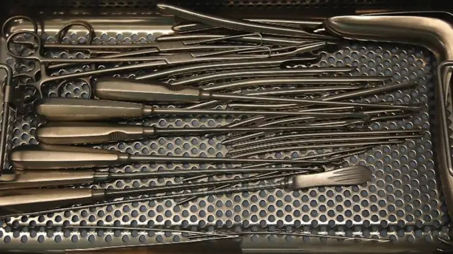 A tray with surgeon tools