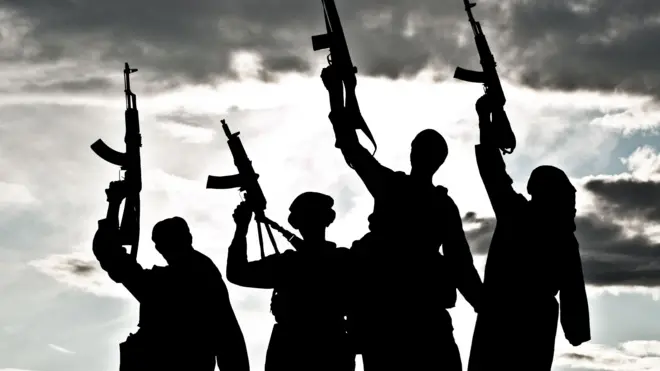 Graphic photo of gunmen