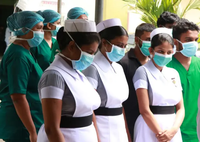Sri Lankan nurses stand in National Hospital during International Nurses Day celebrated program in Colombo. 