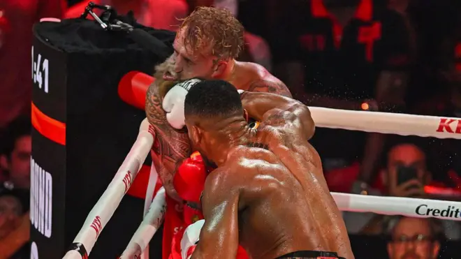 Anthony Joshua connects with right hand against Jake Paul