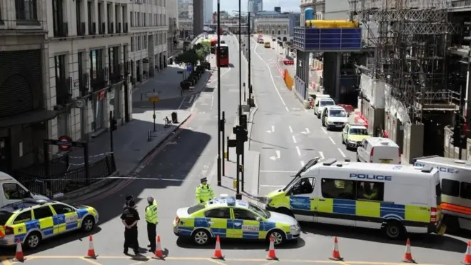 Police operate a cordon on the North side of London Bridge as forensic officers work after last night"s terrorist attack on June 4, 2017