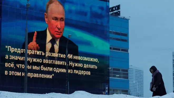 Screen on building showing Vladimir Putin's news conference