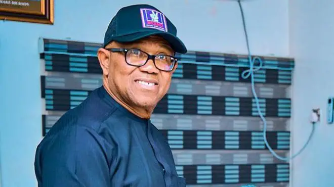 Peter Obi holding certificate