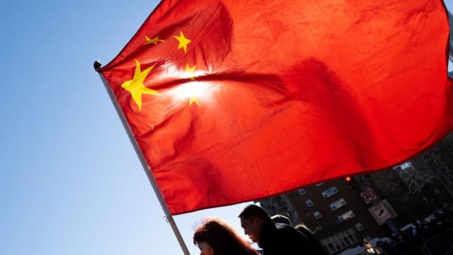 China flag against the blue sky
