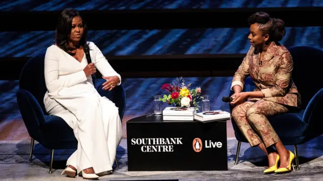 Michelle Obama speaks with Nigerian author Chimamanda Ngozi Adichie at London's Southbank Centre