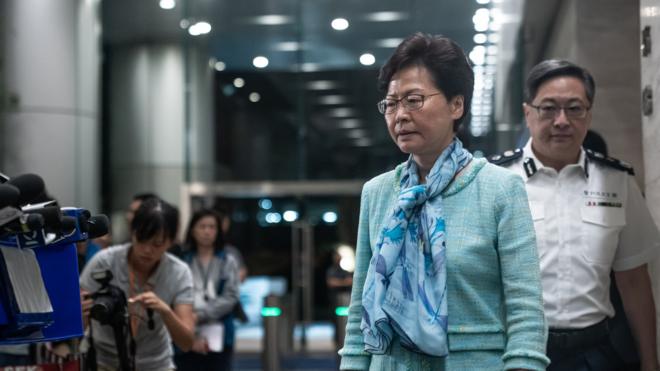 Carrie Lam (front)