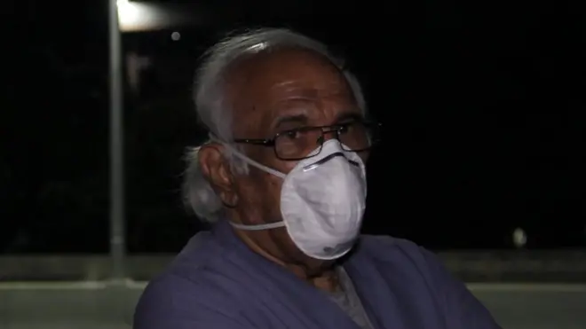 doctor queuing for gasoline