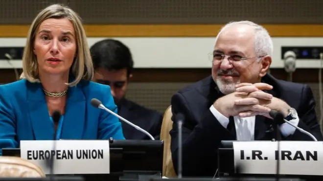 Federica Mogherini (l) announced the EU's plan alongside Iran's Foreign Minister Mohammad Javad Zarif (r)