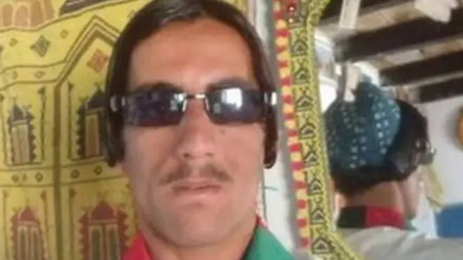 د بهاوالدین پلار ملا جمال الدین بي بي سي ته تاییده کړه، چې زوی یې وسله والو په دې وواژه چې ولې یې له ملي بیرغ څخه غاړه جوړه کړې ده