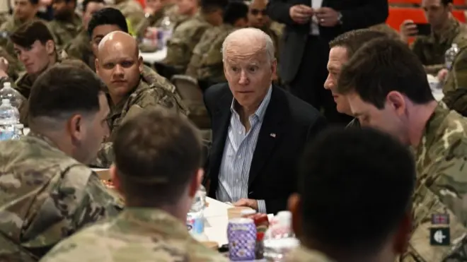 Joe Biden with US troops in Poland