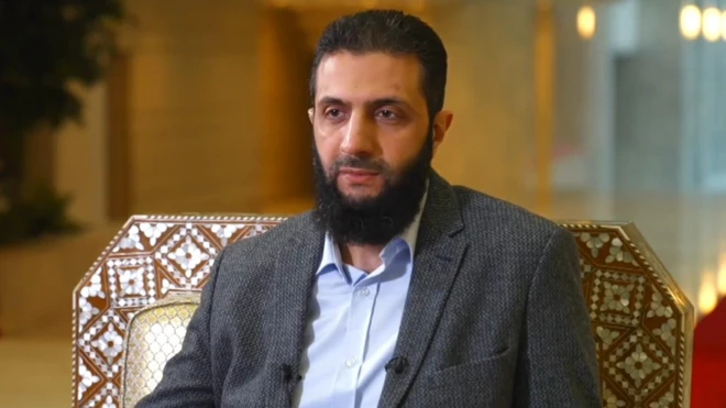 Ahmed al-Sharaa mu kiganiro na BBC mu murwa mukuru Damascus wa Syria. Ifoto yo ku itariki ya 18 Ukuboza (12) mu mwaka wa 2024