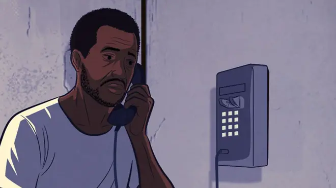An illustration of a man on a wall-mounted telephone. He is wearing a white T-shirt.