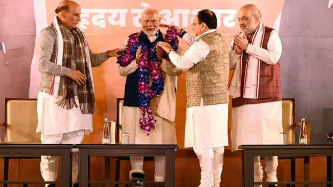 Prime Minister Narendra Modi with Union Ministers and senior BJP leaders Rajnath Singh, Amit Shah, and Union Minister and party National President JP Nadda during celebration of the party's victory in the Maharashtra Assembly elections and in several bypolls, at BJP headquarters on November 23, 2024 in New Delhi, India.