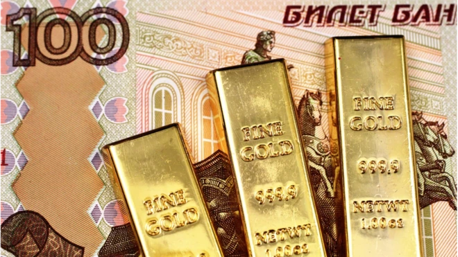 ورقة نقدية فئة مئة روبل مع ثلاث سبائك ذهبية