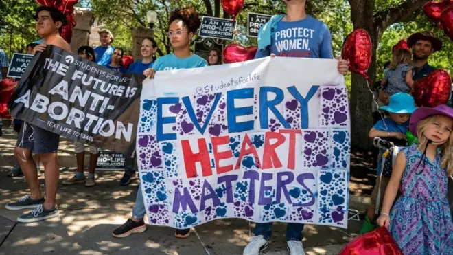 Pro-life protesters stand near the gate of the Texas state capitol at a protest outside the Texas state capitol on 29 May 2021 in Austin, Texas