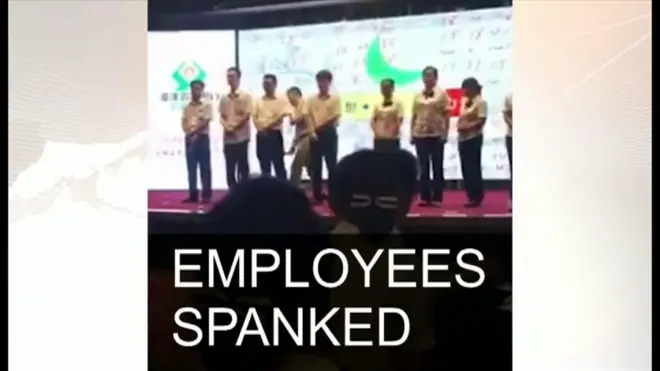 中国の銀行、成績悪いと文字通り「尻叩き」