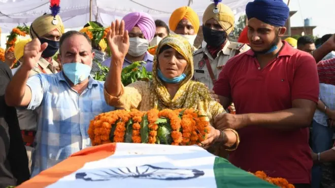 The cremation ceremony for one of the Indian soldiers killed took place on Thursday