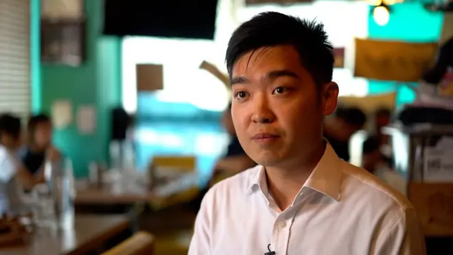 Holding, Hong Kong's independent advocate Andy Chan defied authorities by speaking at the Foreign correspondent club. Before the speech he spoke to the BBC's Danny Vincent