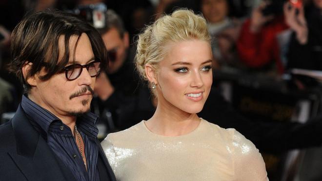 Johnny Depp y Amber Heard en 2011 antes casarse.