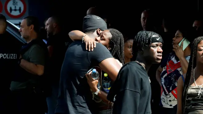 Family members reunite, following a deadly school shooting in Graz, Austria