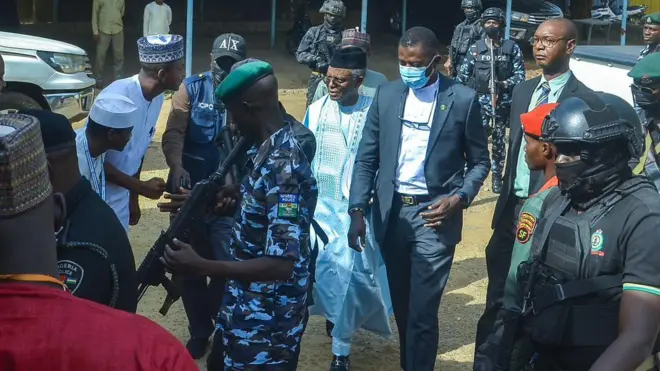 Security surround Nasir El-Rufai inside courtyard on April 21, 2026 