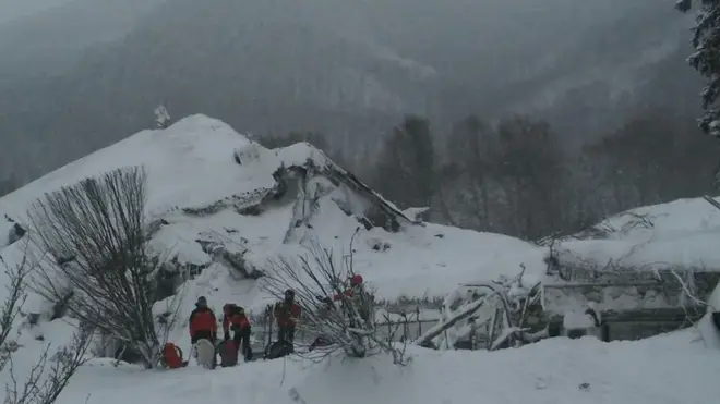 Rescuers at the ruins of the Rigopiano Hotel, 19 January