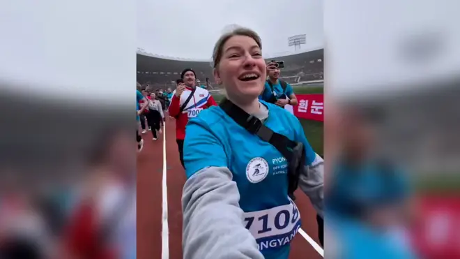 zena trci maraton u severnoj koreji
