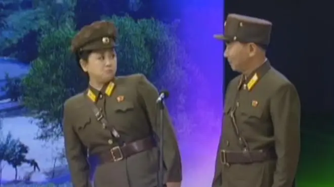 Two soldiers perform a comedy sketch