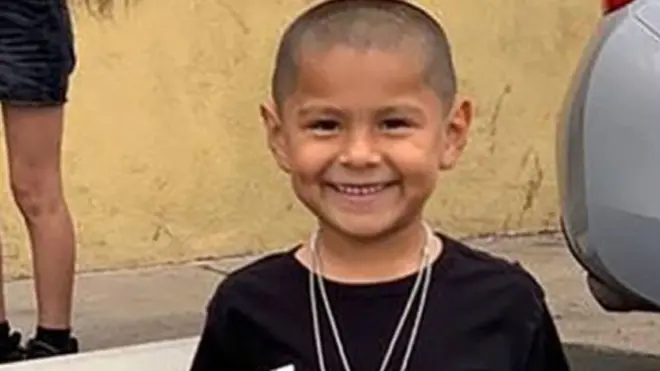 गोलीबारी में मारा गया बच्चा